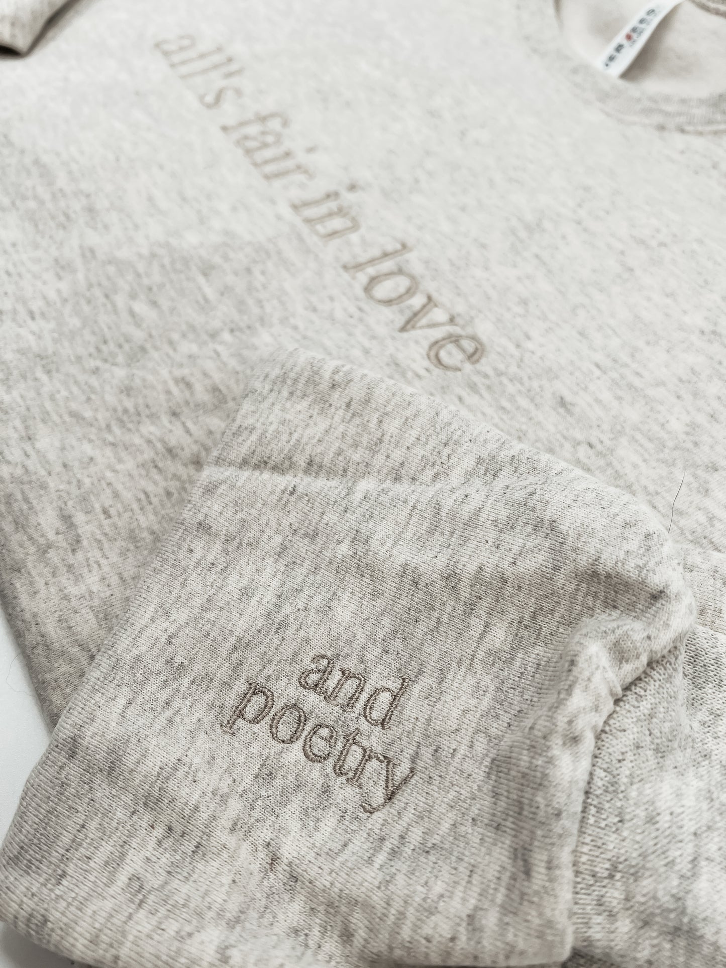 All’s Fair in Love and Poetry Embroidered Crewneck