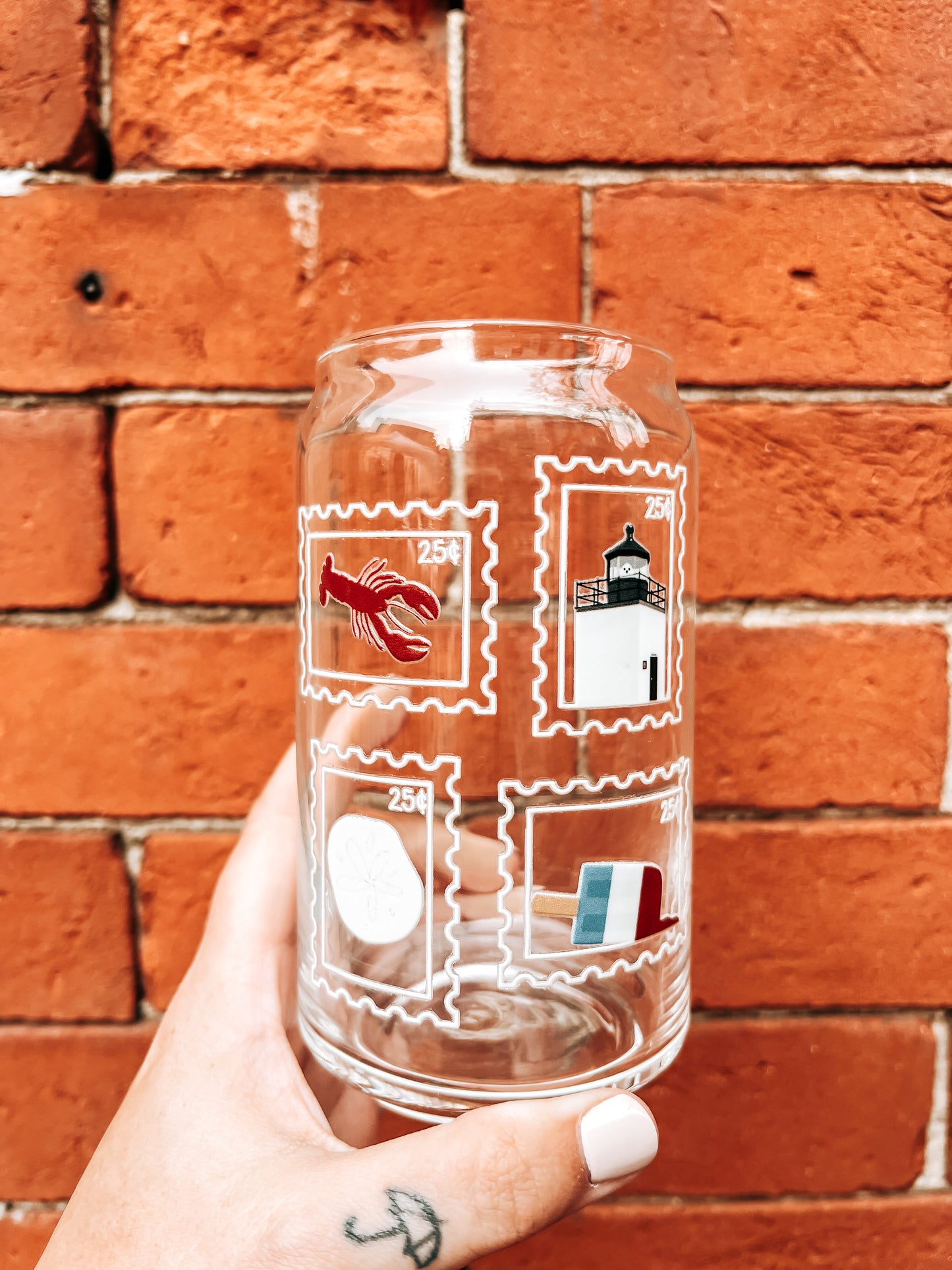 New England Stamp Glass Can