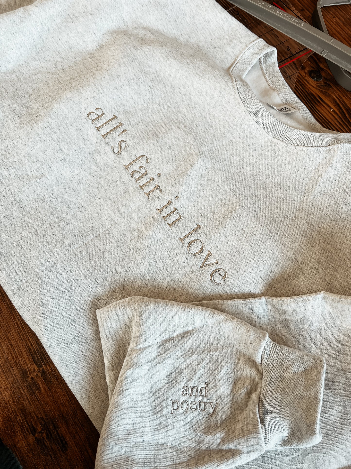 PREORDER All’s Fair in Love and Poetry Embroidered Crewneck